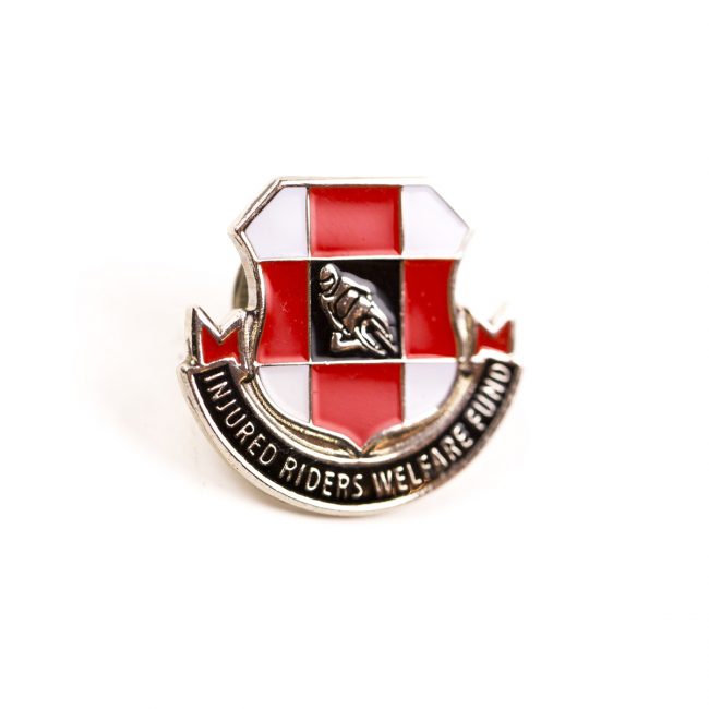 Red and white metal badge