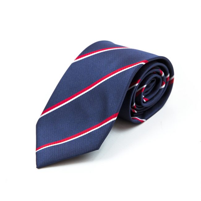 Navy blue and red striped tie rolled up