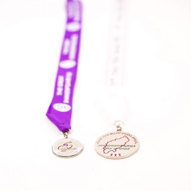 two custom award medals,