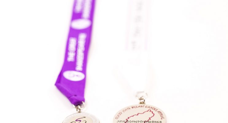 two custom award medals,