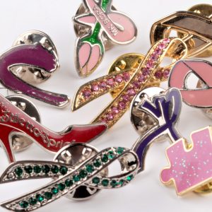 Group of charity pin badges