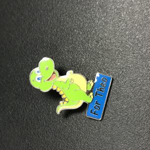 Dinosaur pin badge with child's name