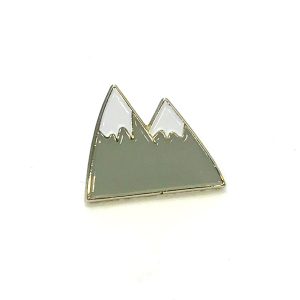 Grey mountain metal pin badge