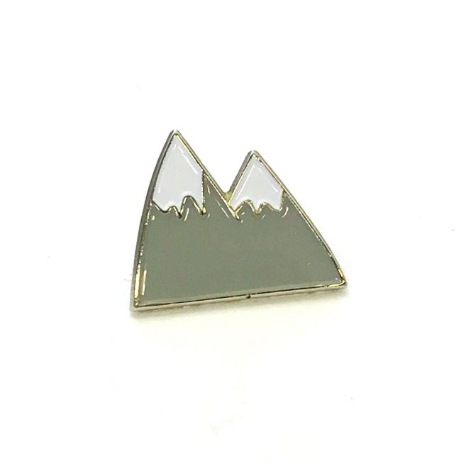 Grey mountain metal pin badge