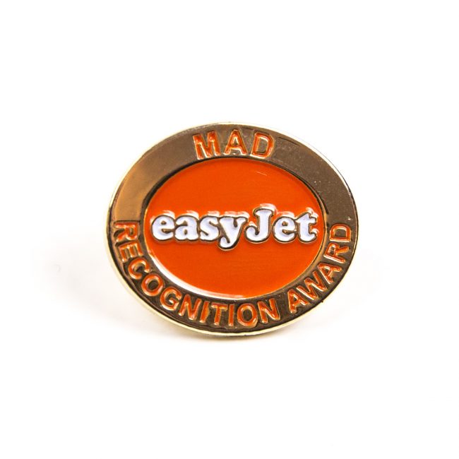 Gold and orange EasyJet logo award badge