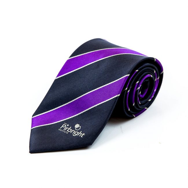 Black and purple stripe tie rolled up