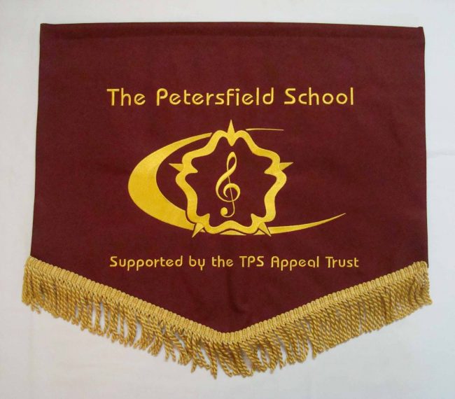 Brown and yellow school pennants with school logo