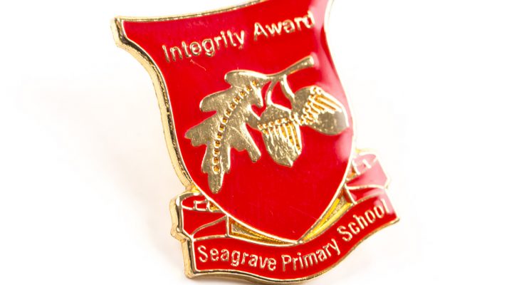 custom award badges, personalised award badges, bespoke award badges,