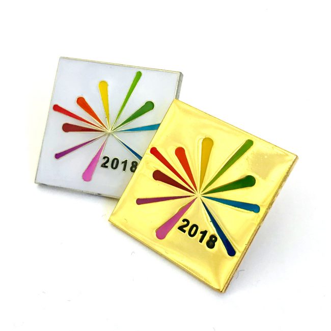 Two square school badges with 2018 and colourful logo