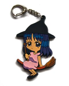 Cartoon witch on broomstick soft keychain
