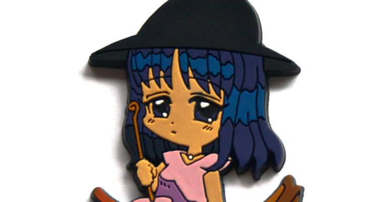 Cartoon witch on broomstick soft keychain