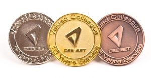 Three Award badges in silver, gold and nickel