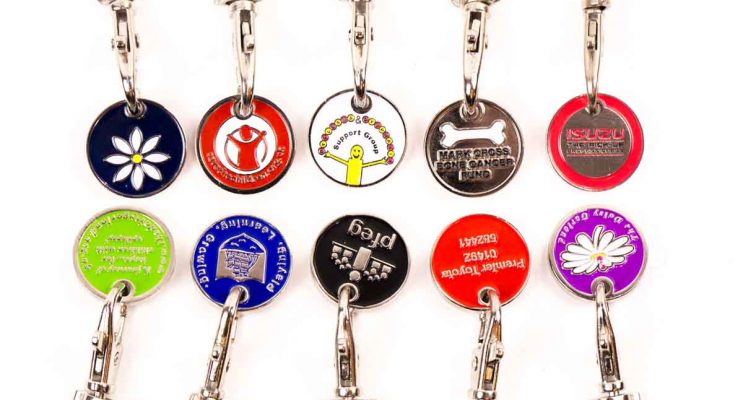 10 Trolley Coins with charity logos