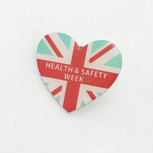 Heart shaped badge with Health and Safety Week