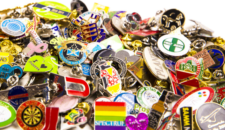 A pile of bespoke badges